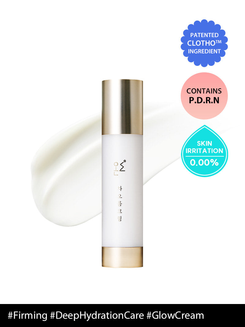Skincare bottle with gold cap on a white background, featuring text about ingredients and benefits.