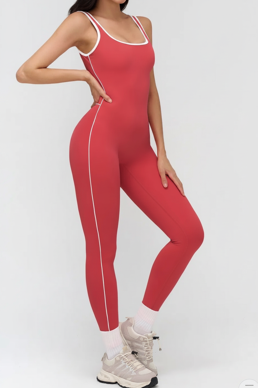 Red athletic outfit with white accents on a plain background